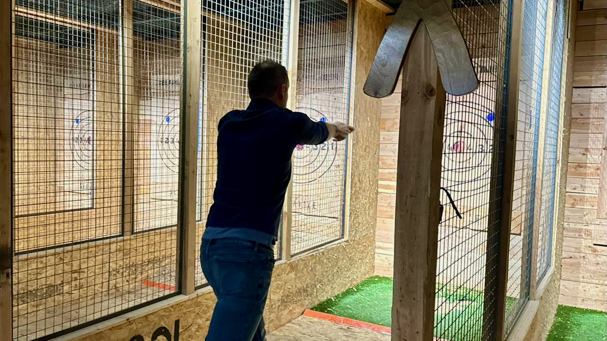 Team member at axe throwing